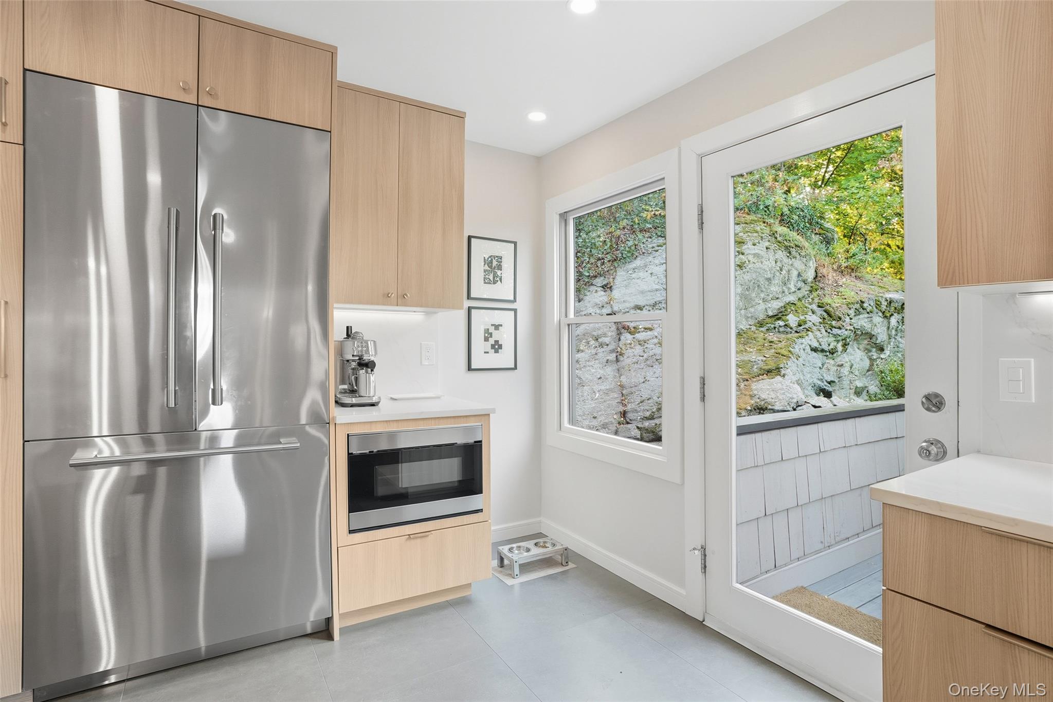 216 Purchase Street, Unit P Rye, NY 10580 - Photo 11 of 36 a kitchen with a refrigerator and a stove
