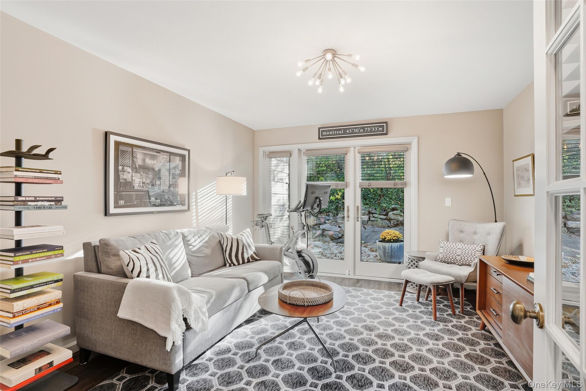 216 Purchase Street, Unit P Rye, NY 10580 - Photo 15 of 36 a living room with furniture and a large window