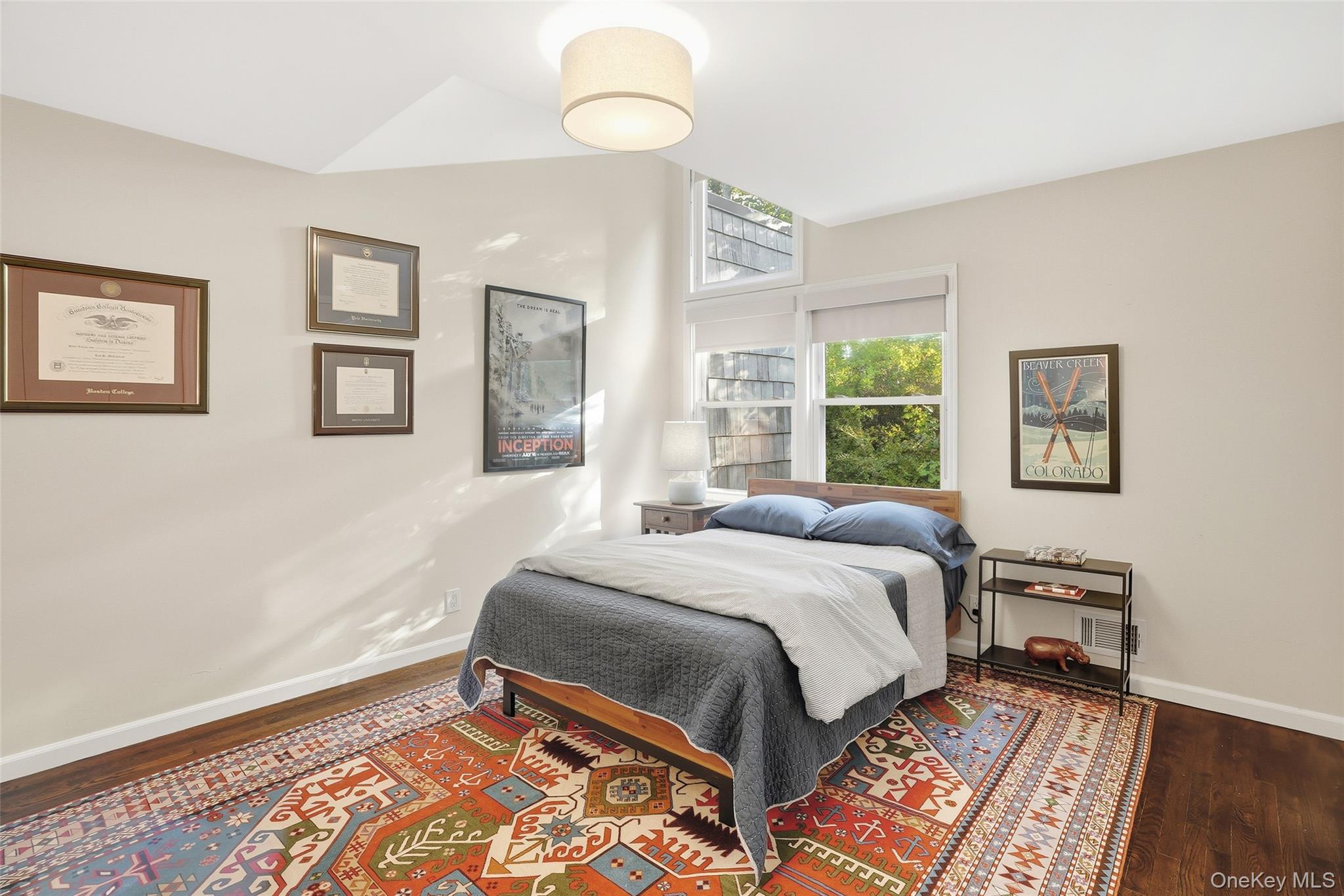 216 Purchase Street, Unit P Rye, NY 10580 - Photo 23 of 36 a bedroom with a bed lamp and a window