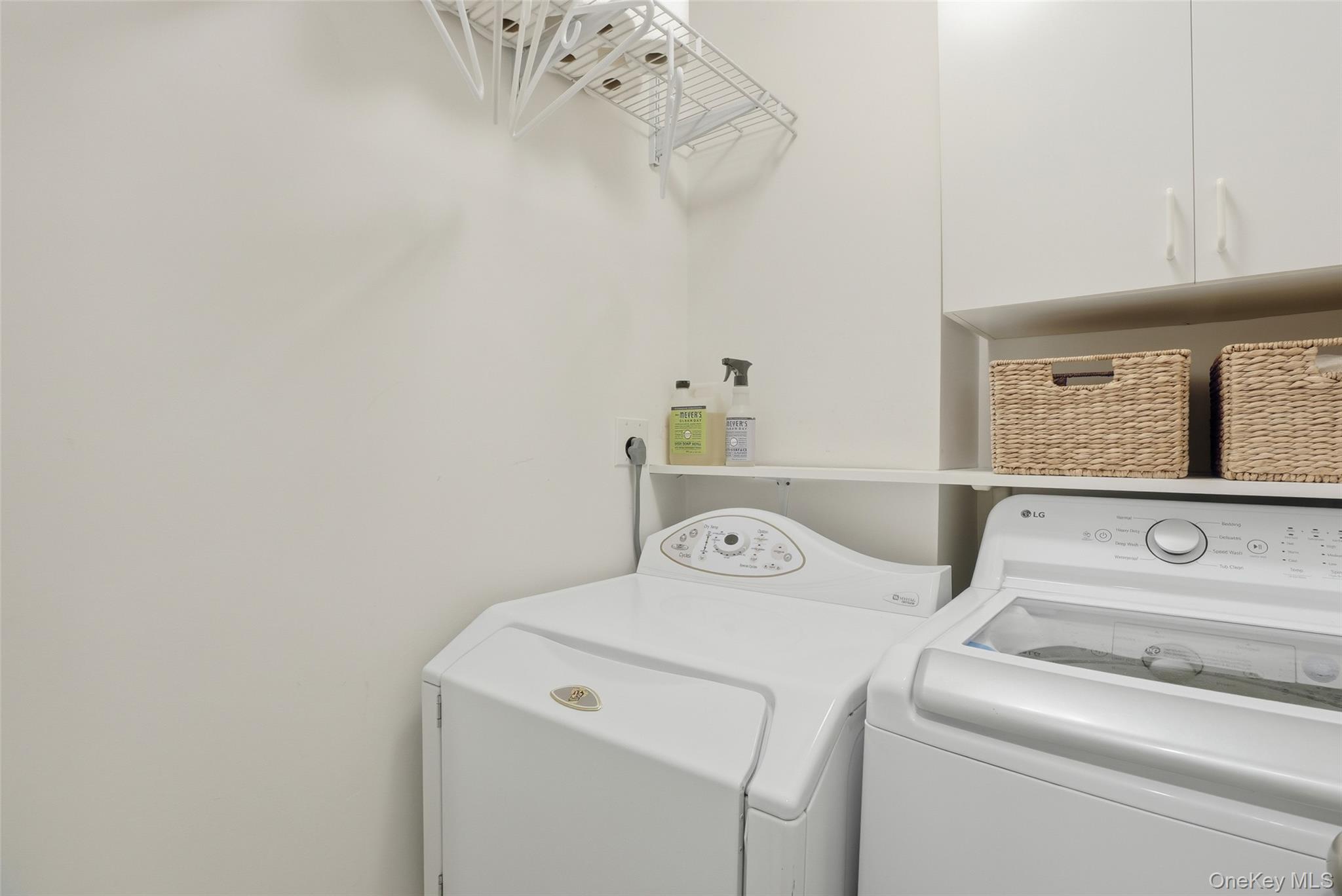 216 Purchase Street, Unit P Rye, NY 10580 - Photo 27 of 36 a utility room with dryer and washer