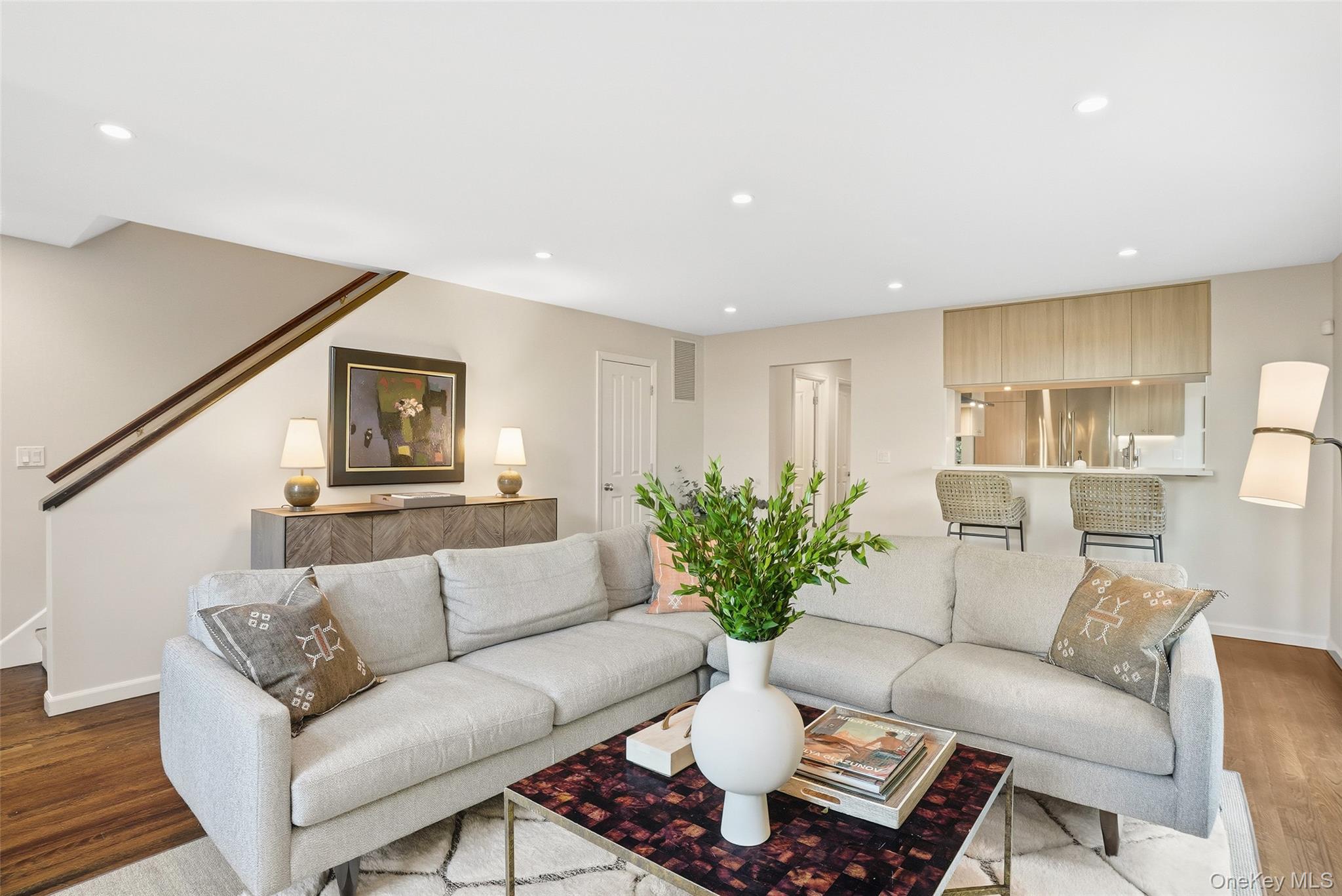 216 Purchase Street, Unit P Rye, NY 10580 - Photo 35 of 36 a living room with furniture potted plant and kitchen view