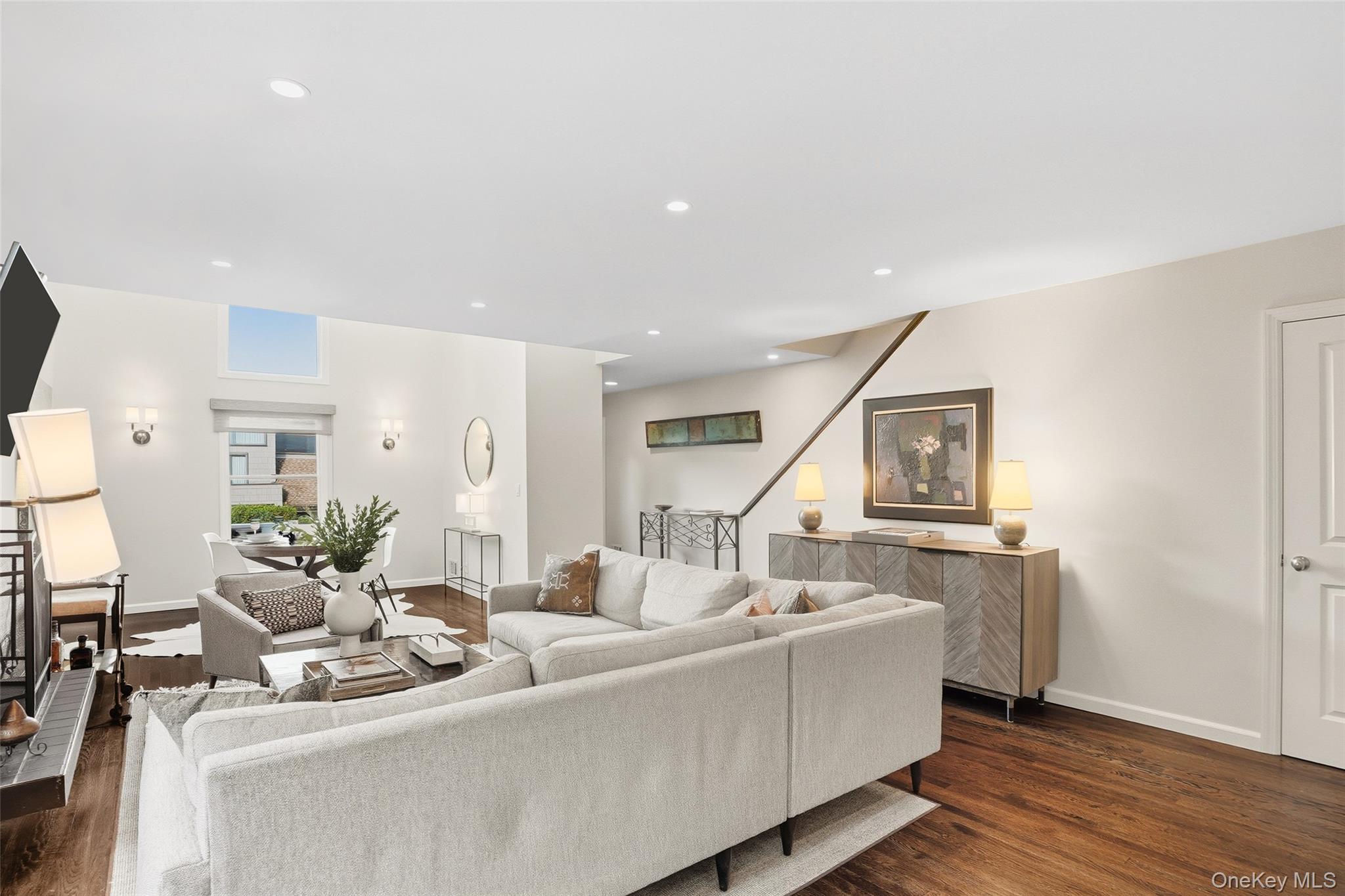 216 Purchase Street, Unit P Rye, NY 10580 - Photo 36 of 36 a living room with furniture and a wooden floor