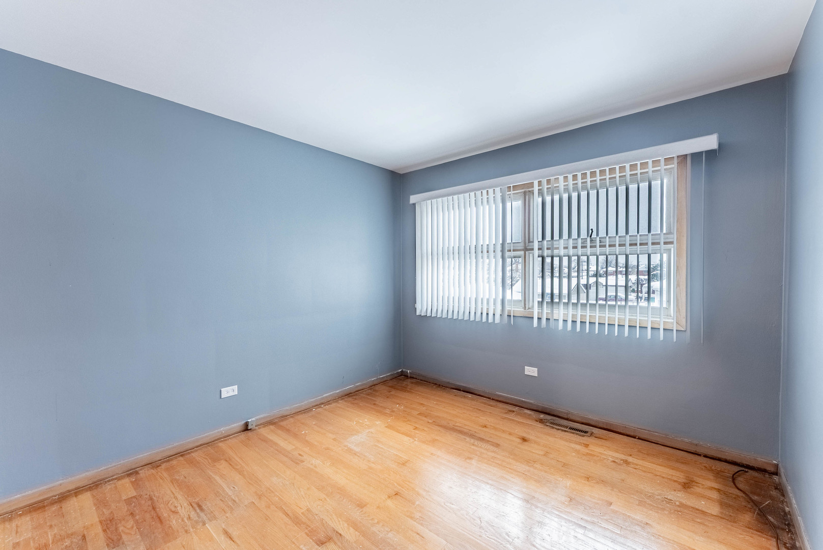 1245 South Mannheim Road Westchester, IL 60154 - Photo 11 of 24 a view of an empty room with a window
