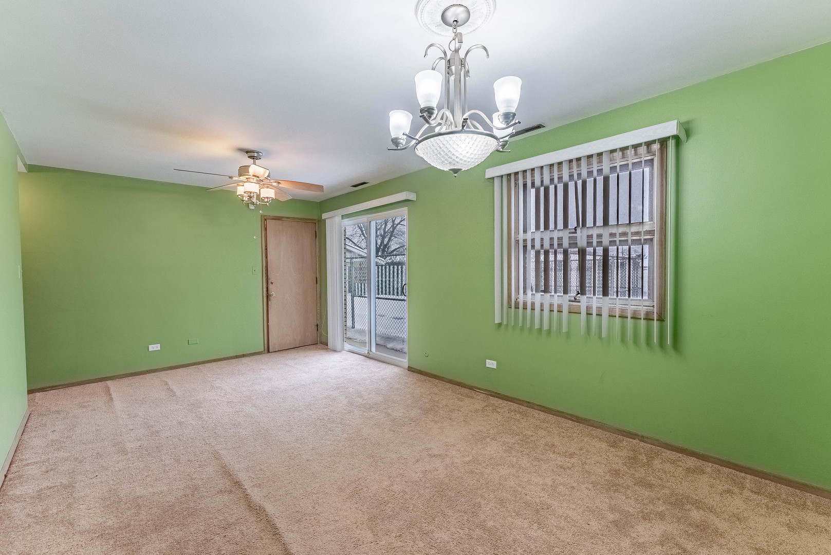 1245 South Mannheim Road Westchester, IL 60154 - Photo 14 of 24 a view of a room with a window and chandelier