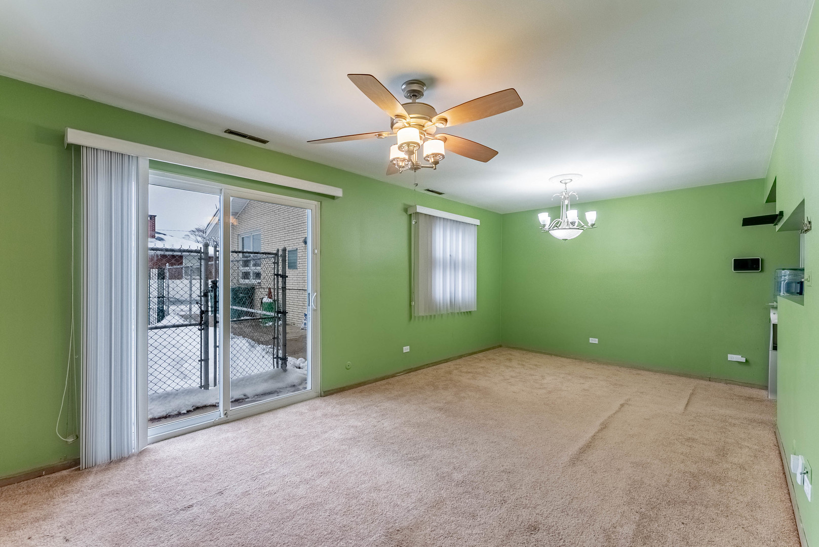 1245 South Mannheim Road Westchester, IL 60154 - Photo 15 of 24 a view of an empty room with a ceiling fan