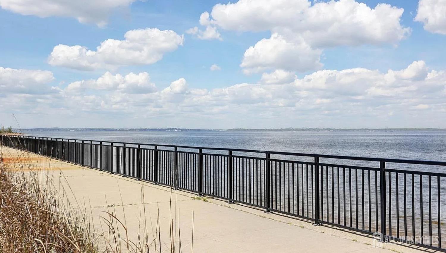 106 Boulevard West Old Bridge, NJ 07735 - Photo 33 of 34 a balcony with an ocean view