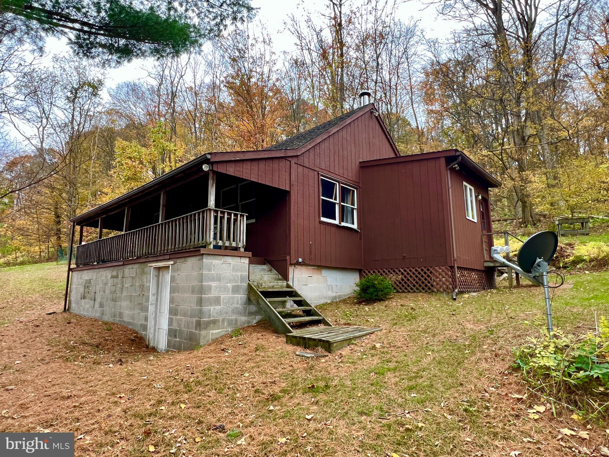 1858 Sandy Run Road Hopewell, PA 16650 - Photo 4 of 35 a house view with a backyard space