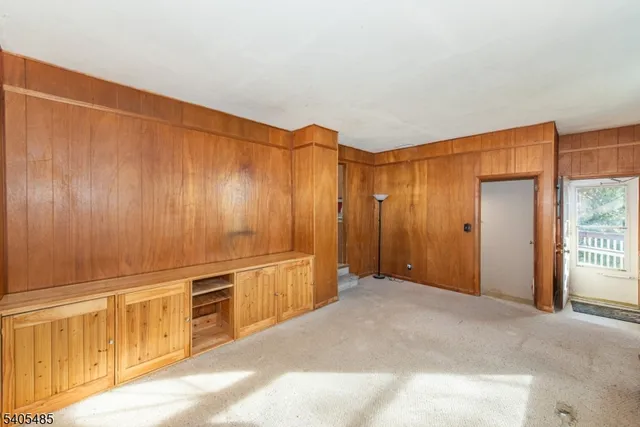 a view of a room with an empty space