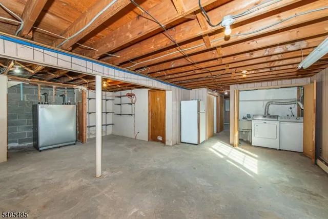 a view of a utility room with closet
