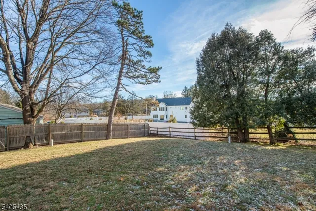 a view of house with outdoor space