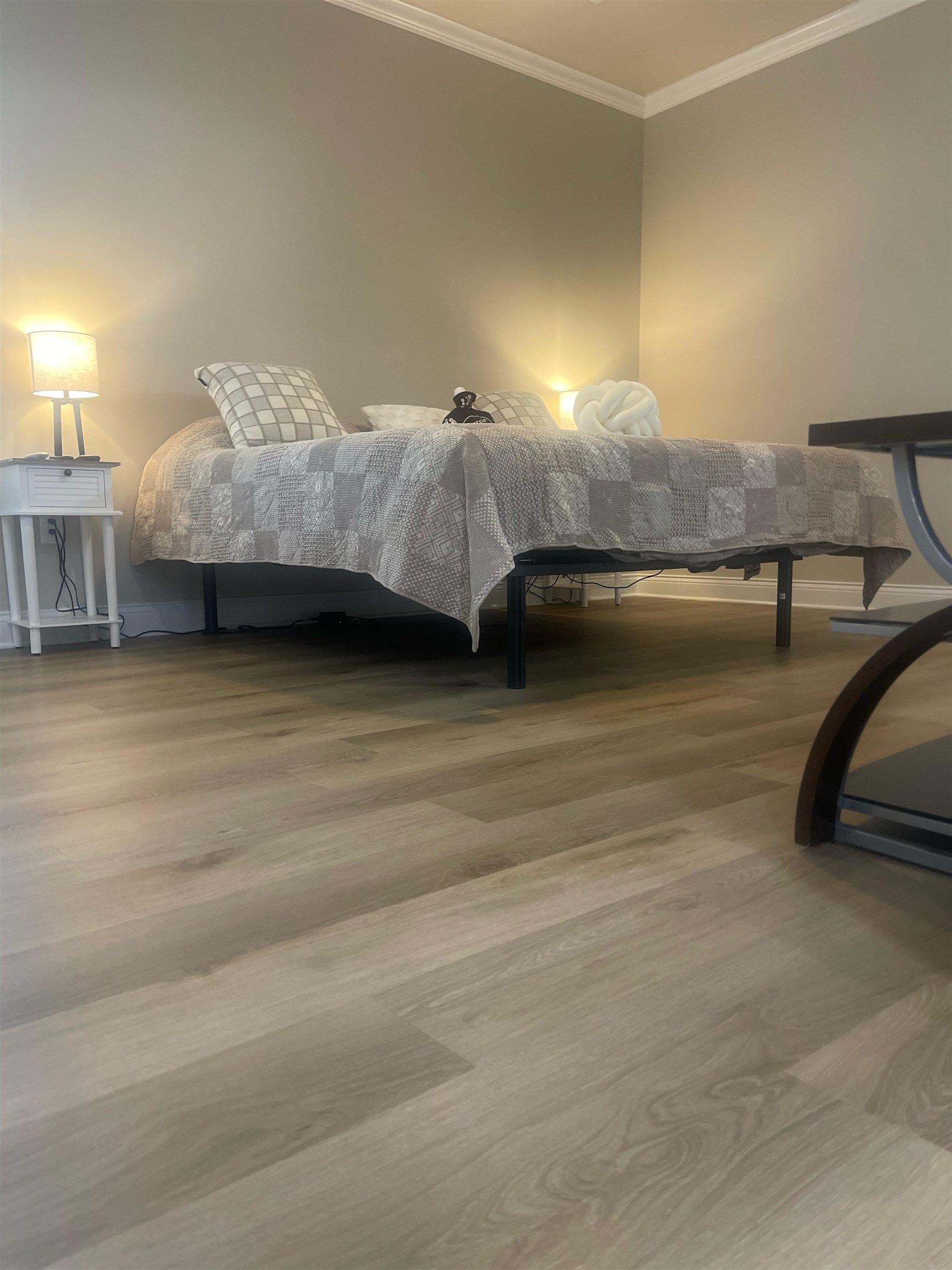 210 Church Street Ripley, TN 38063 - Photo 11 of 21 Light wood-finish flooring complements the neutral wall color