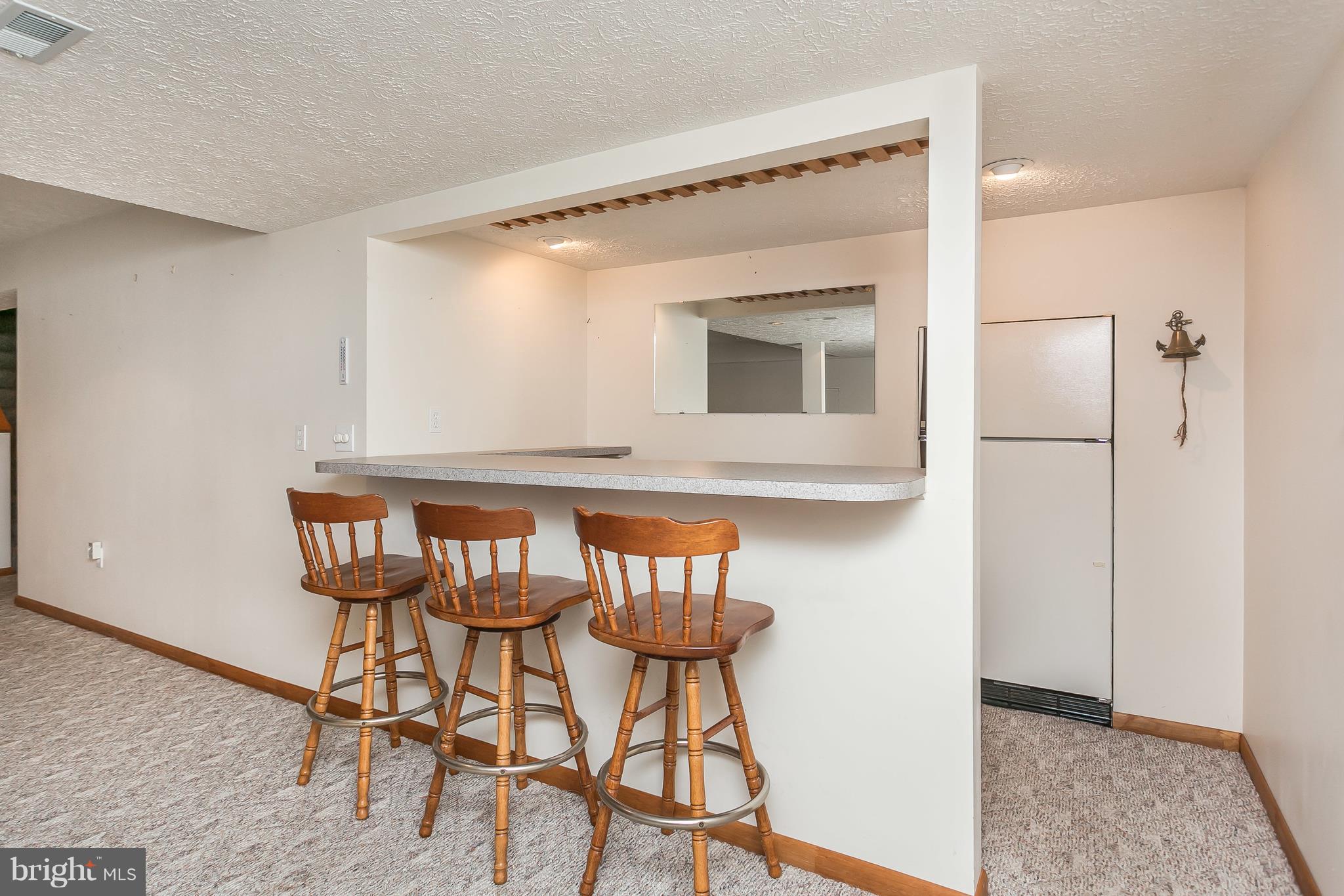 11913 Manor Road Glen Arm, MD 21057 - Photo 35 of 47 Bar in Lower Level with Refrigerator