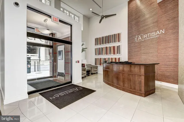 a view of a kitchen with furniture and cabinets