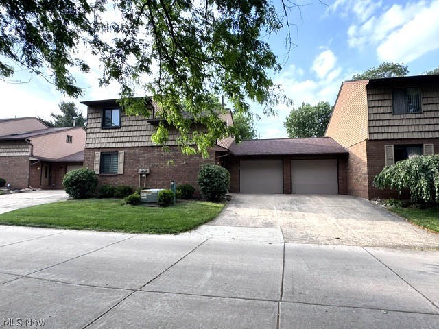 305 Guy's Run Road, Unit 305 Akron, OH 44319 - Photo 1 of 37 front of condo with no shared walls