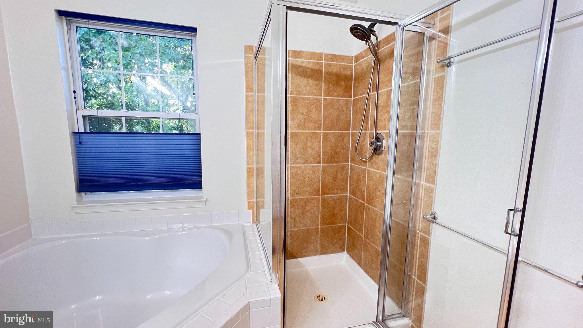 4100 Flower Fairfax, VA 22030 - Photo 18 of 47 a bathroom with a shower and a toilet