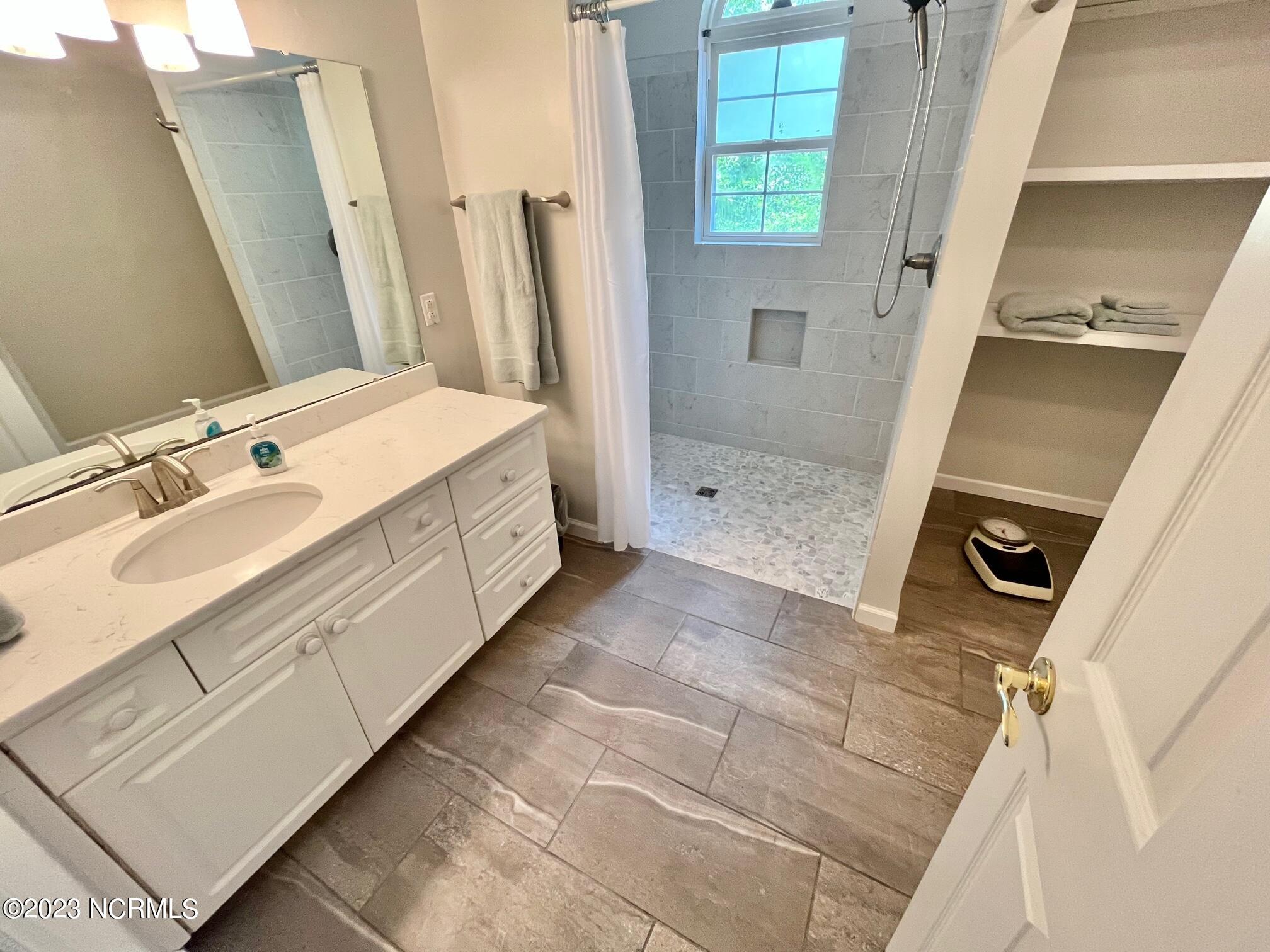 926 Buckingham Road New Bern, NC 28562 - Photo 15 of 23 master shwr and vanity