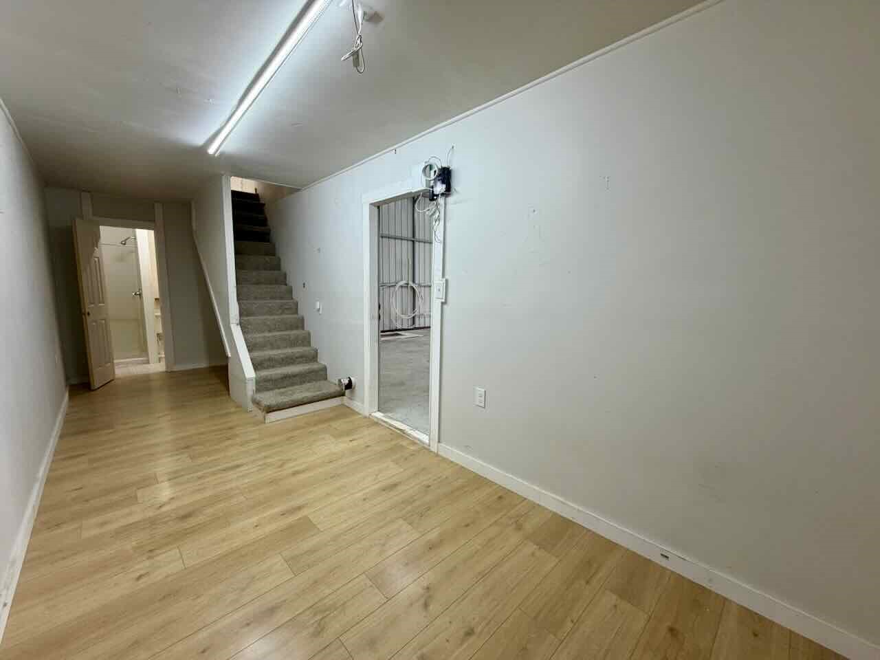 3844 South Pine Island Road Beaumont, TX 77713 - Photo 17 of 24 a view of an empty room with stairs