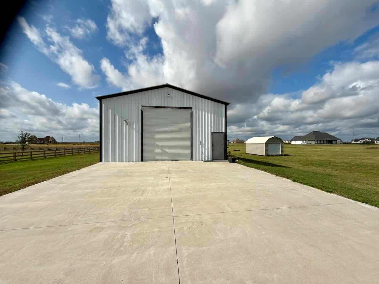 3844 South Pine Island Road Beaumont, TX 77713 - Photo 4 of 24 a front view of a house with a yard