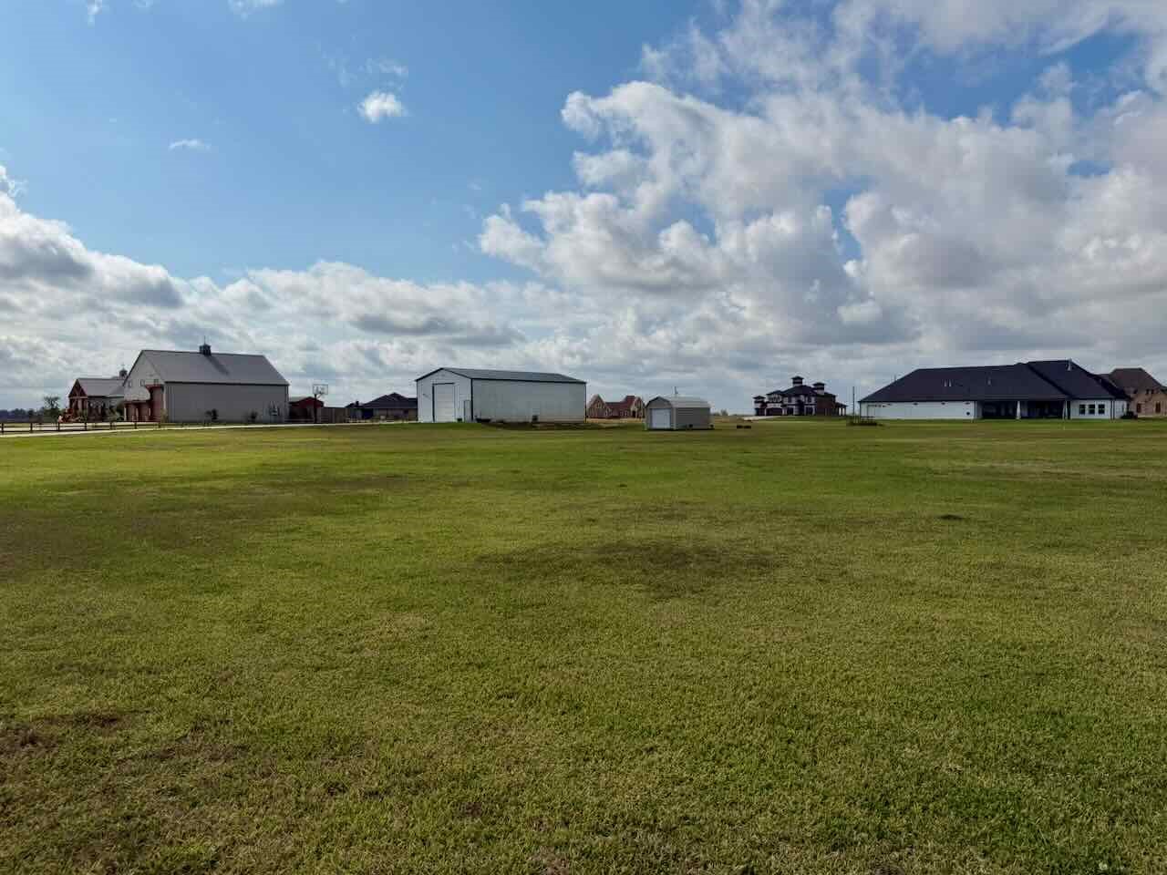 3844 South Pine Island Road Beaumont, TX 77713 - Photo 9 of 24 a view of a big room with a big yard and outdoor seating