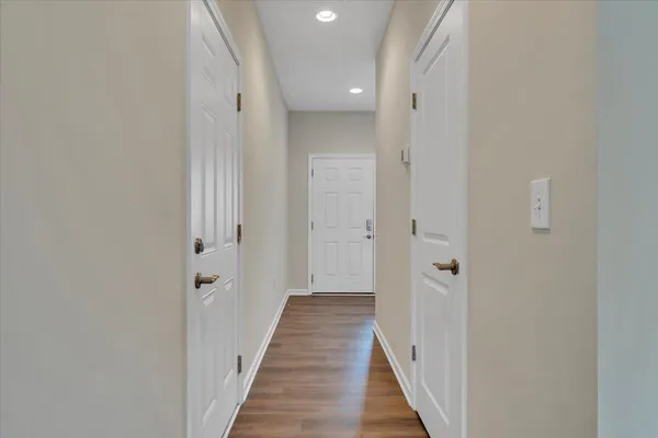 a view of a bathroom from the hallway
