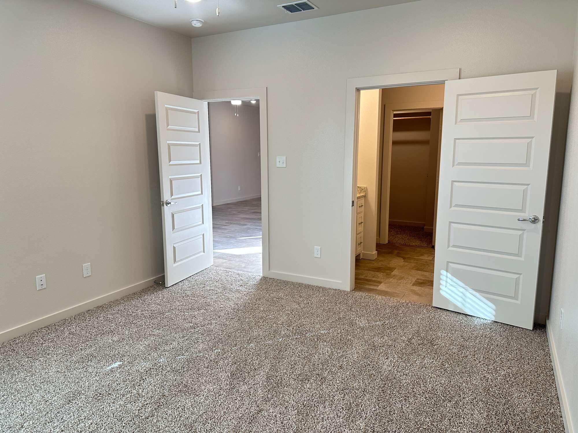 1113 North 7th Street Wolfforth, TX 79382 - Photo 9 of 17 an empty room with closet and closet