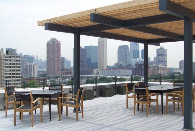 232 Pavonia Avenue, Unit 608 Jersey City, NJ 07302 - Photo 14 of 14 a view of chairs and table in the patio