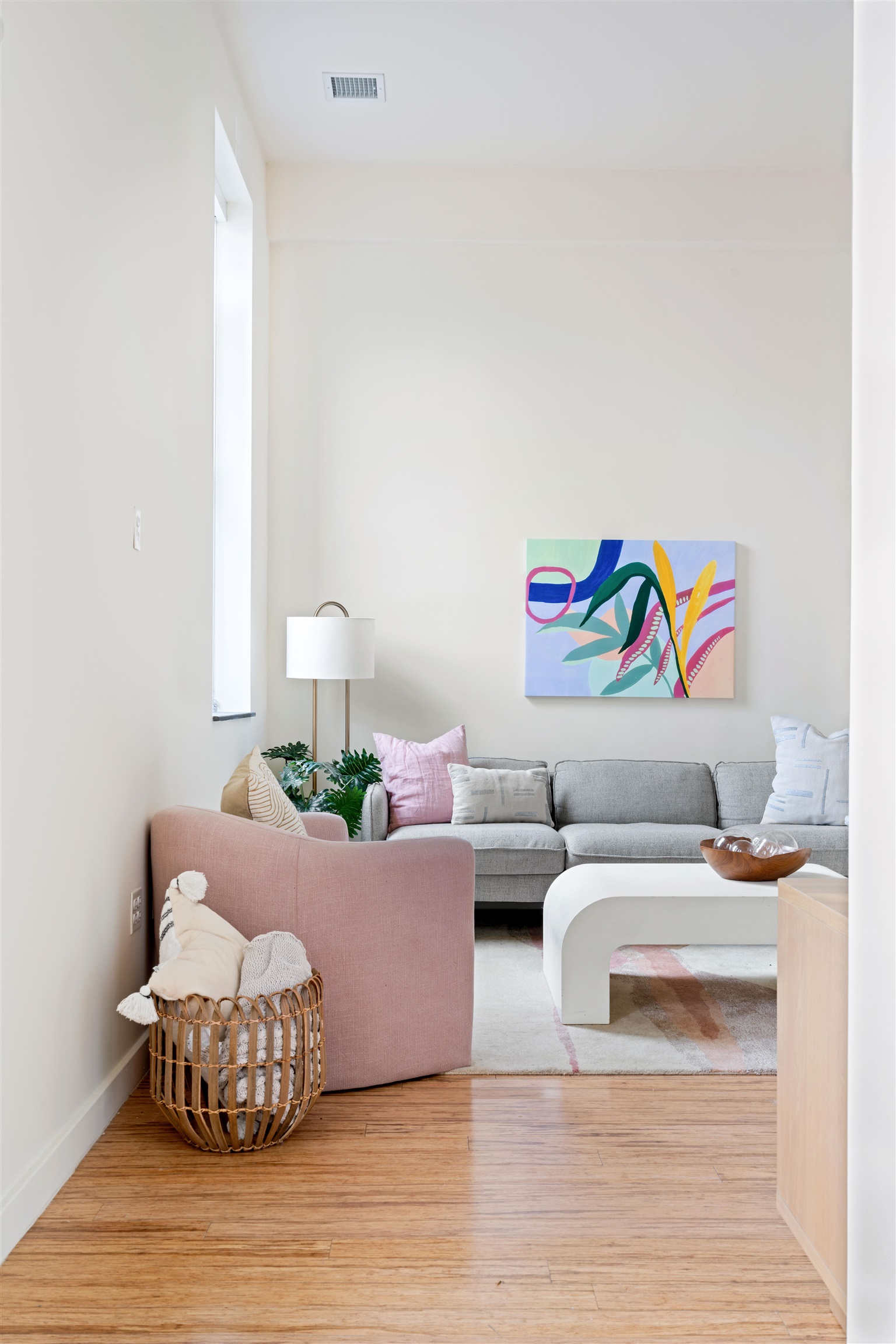232 Pavonia Avenue, Unit 608 Jersey City, NJ 07302 - Photo 7 of 14 a living room with furniture and wooden floor