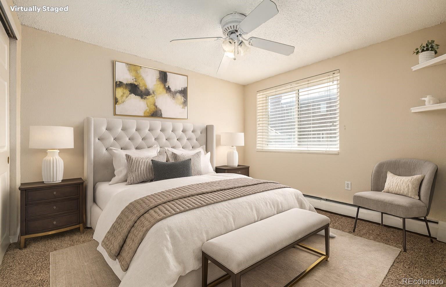 1125 North Washington Street, Unit 207 Denver, CO 80203 - Photo 3 of 33 a bedroom with a bed and a couch