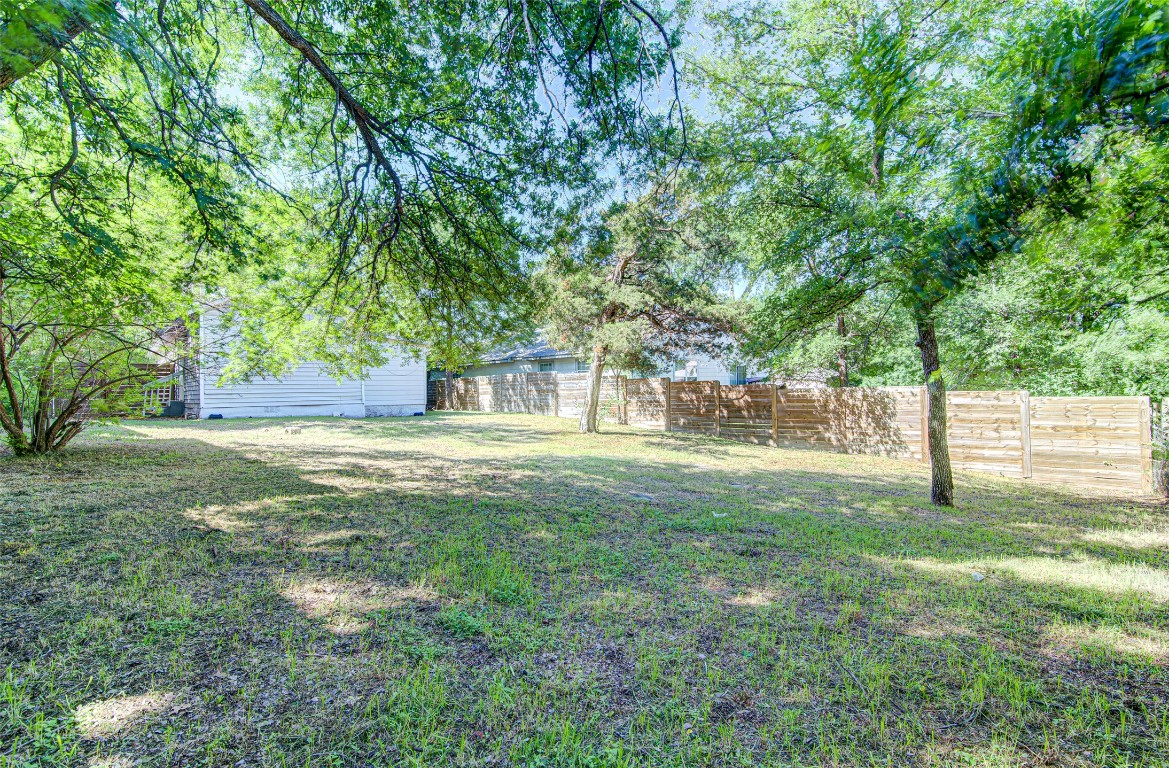 2910 East 12th Street Austin, TX 78702 - Photo 2 of 18 View of yard featuring a fenced backyard