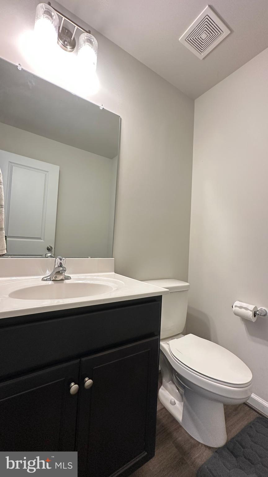 46 Lookover Terrace Stuarts Draft, VA 24477 - Photo 14 of 45 a bathroom with a sink a toilet and mirror