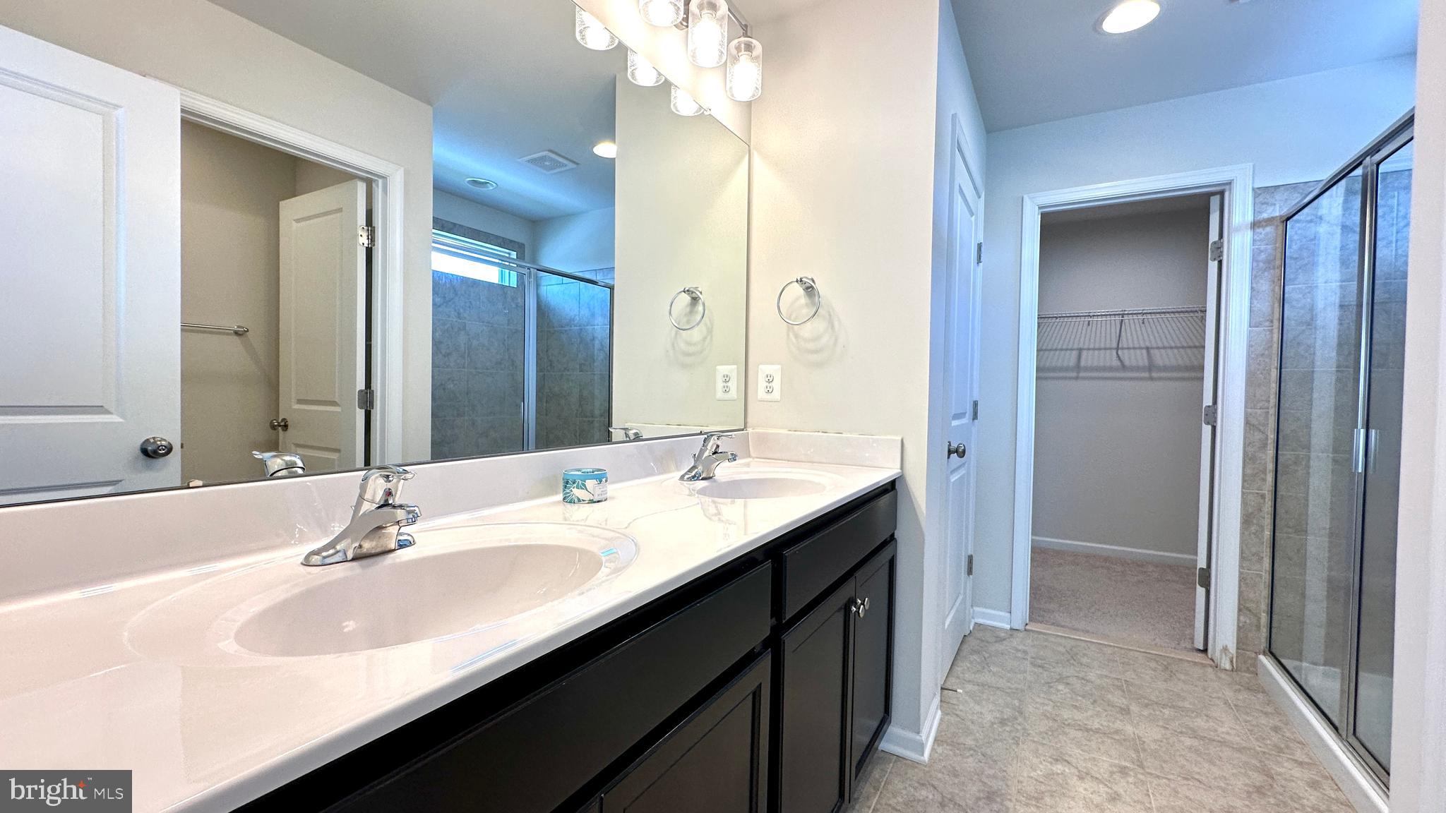 46 Lookover Terrace Stuarts Draft, VA 24477 - Photo 18 of 45 a bathroom with a double vanity sink a and mirror