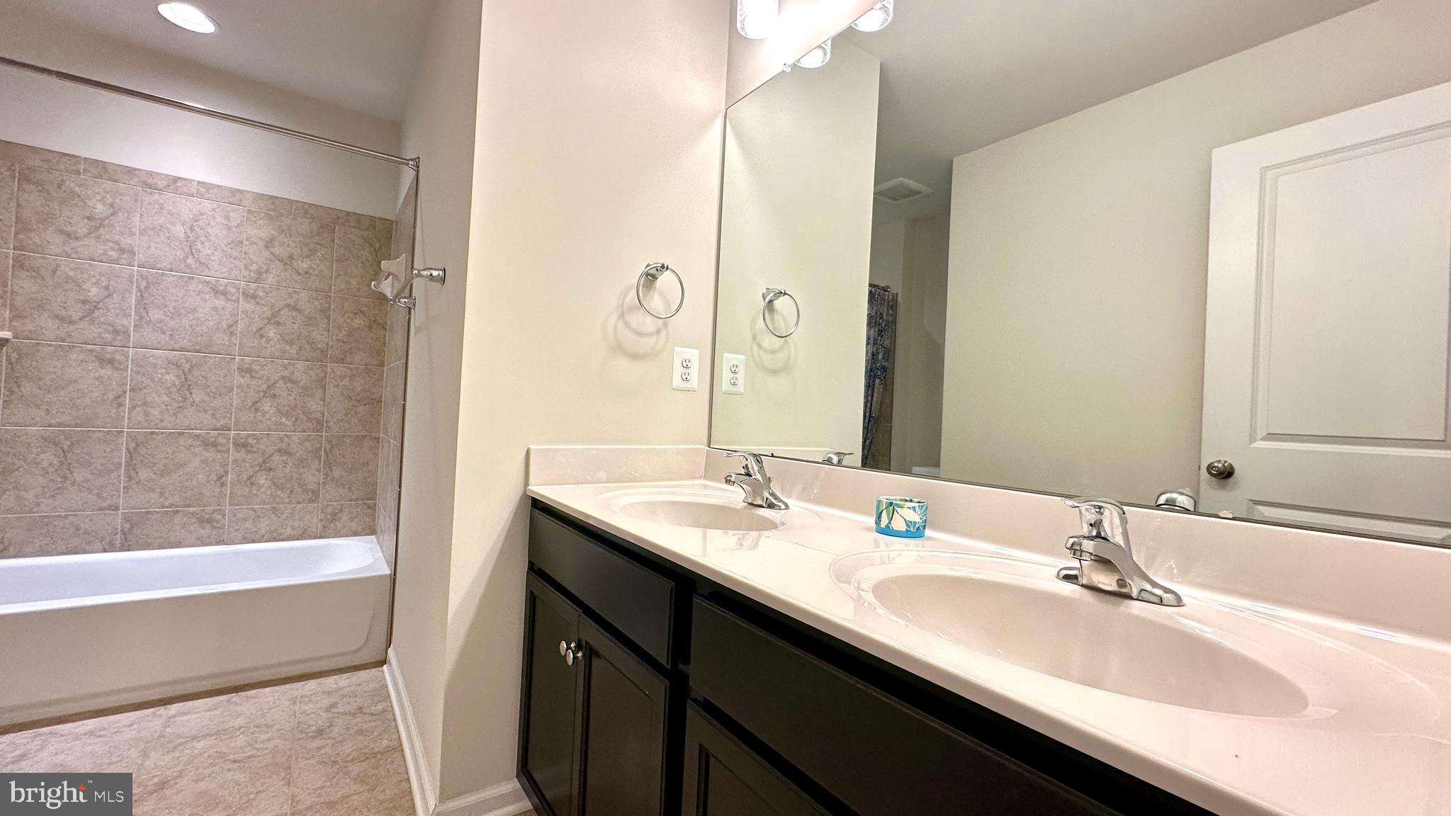 46 Lookover Terrace Stuarts Draft, VA 24477 - Photo 23 of 45 a bathroom with a granite countertop sink and a mirror