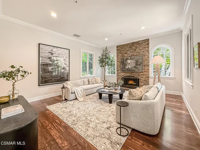 a kitchen with a sink and a large window