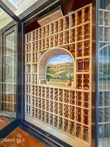 a kitchen with a sink a stove and cabinets