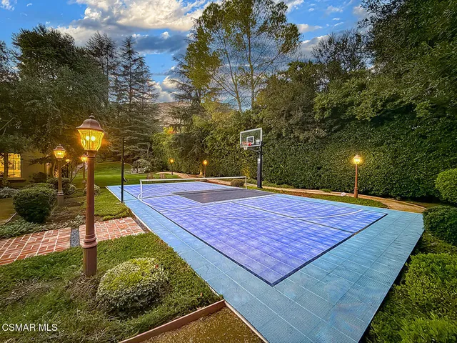 a view of a patio with swimming pool table and chairs