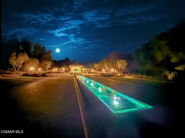 a view of a chairs and table on the terrace