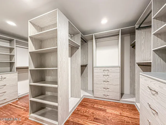 a view of outdoor space with garden and trees