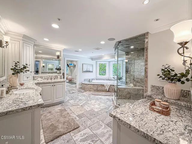 a living room with lots of furniture and a table