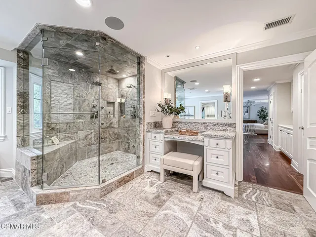 a view of a patio with table and chairs a barbeque and potted plants