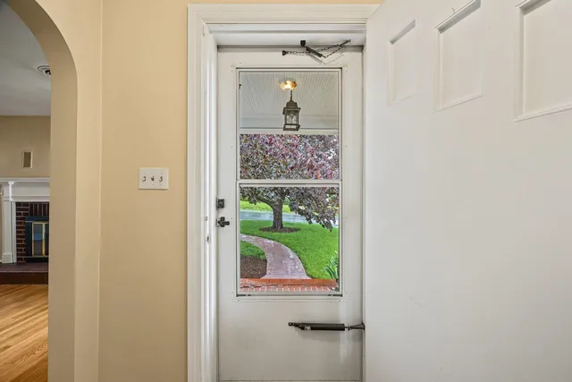 a view of a bathroom from a hallway