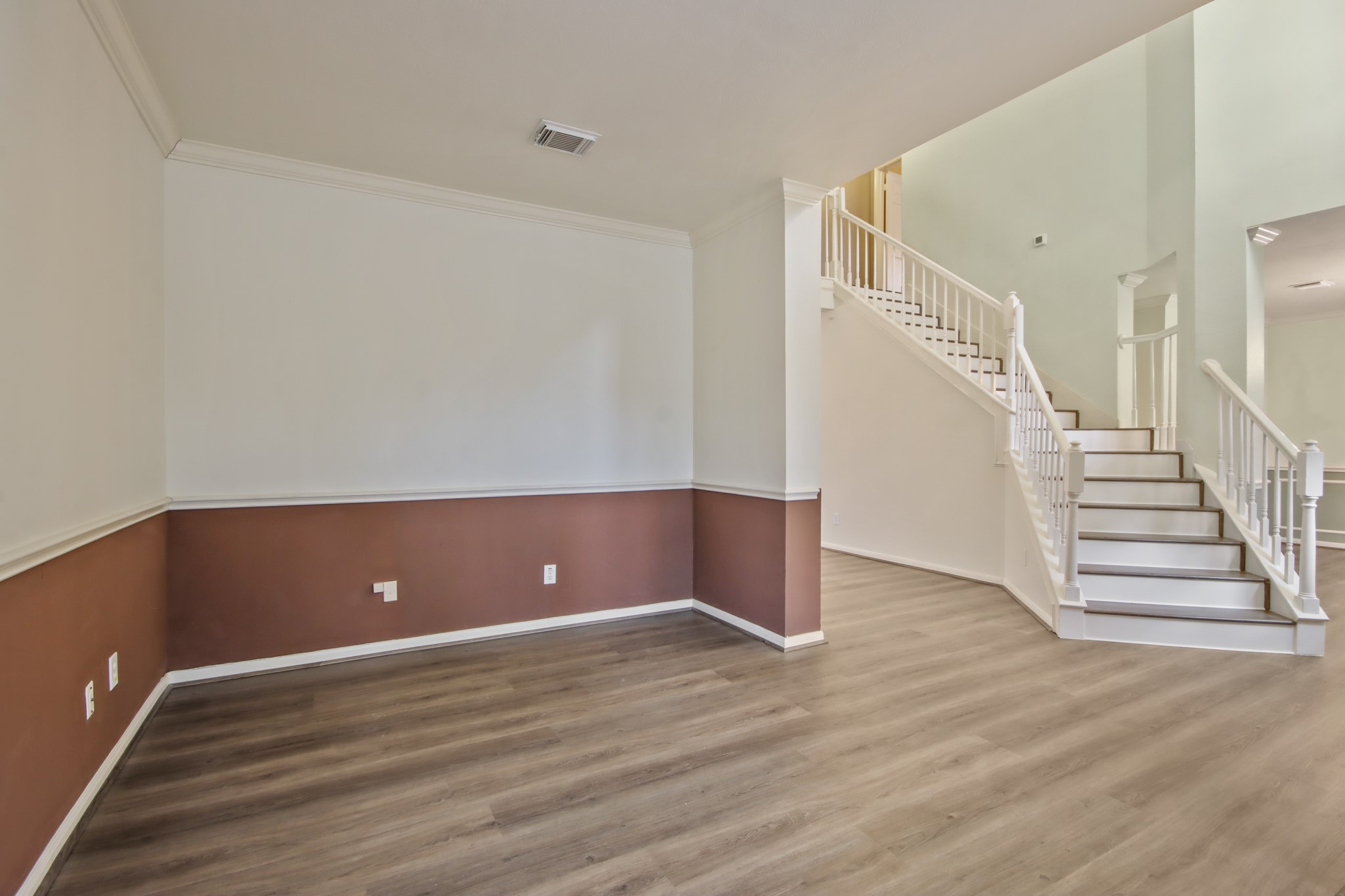 111 South Dreamweaver Circle Spring, TX 77380 - Photo 12 of 30 wooden view of an empty room with stairs and ventilation