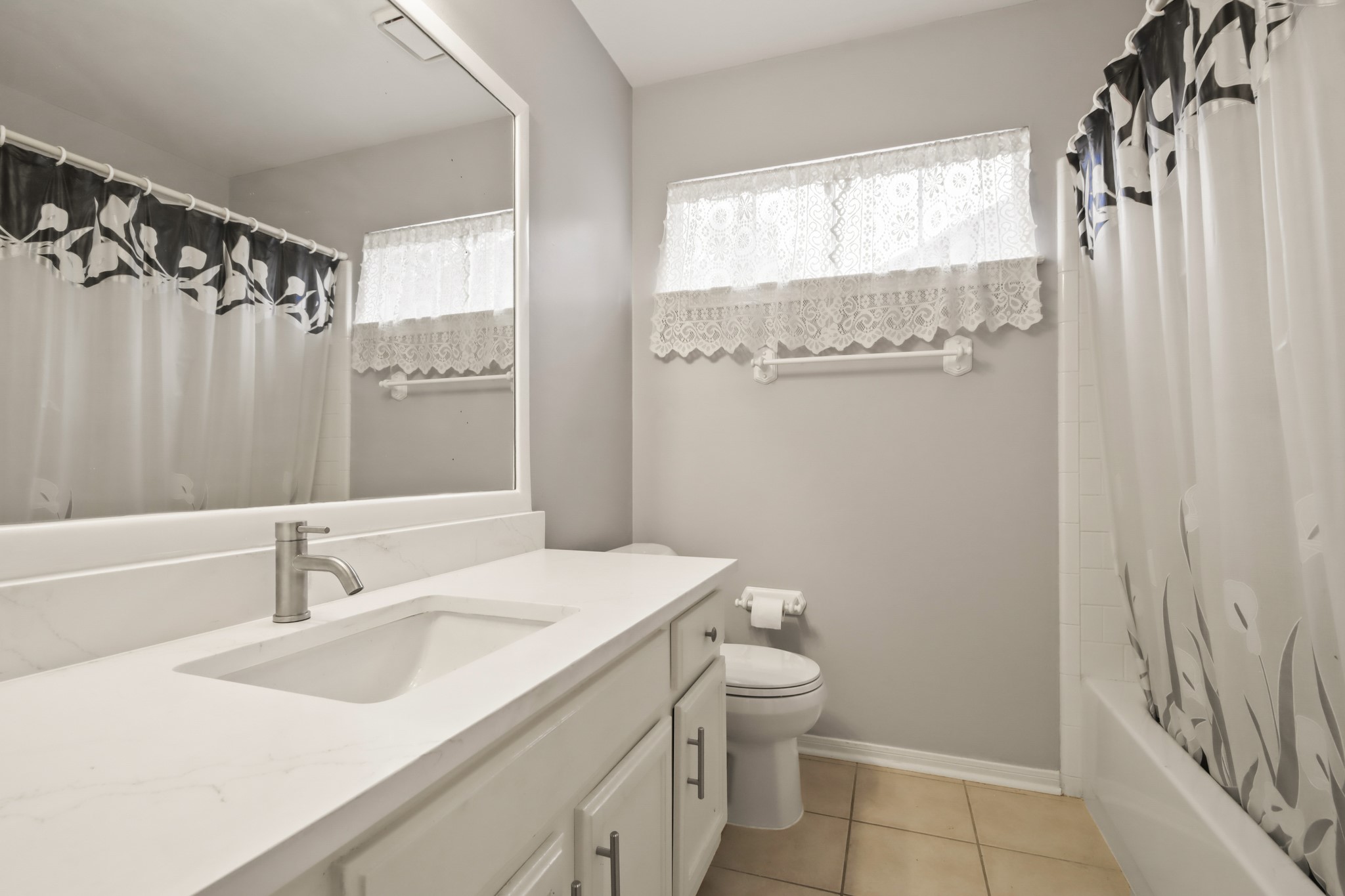 111 South Dreamweaver Circle Spring, TX 77380 - Photo 15 of 30 a bathroom with a sink a toilet and shower