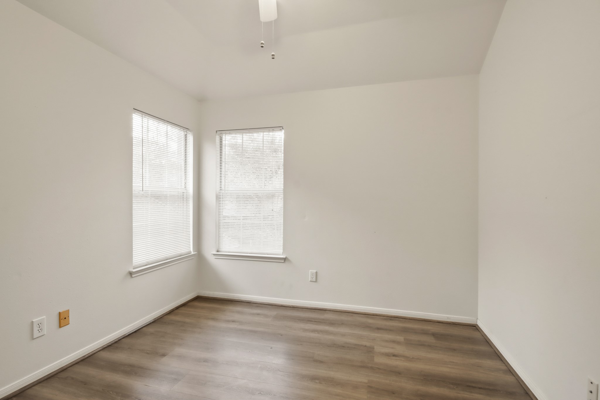 111 South Dreamweaver Circle Spring, TX 77380 - Photo 18 of 30 an empty room with wooden floor and windows