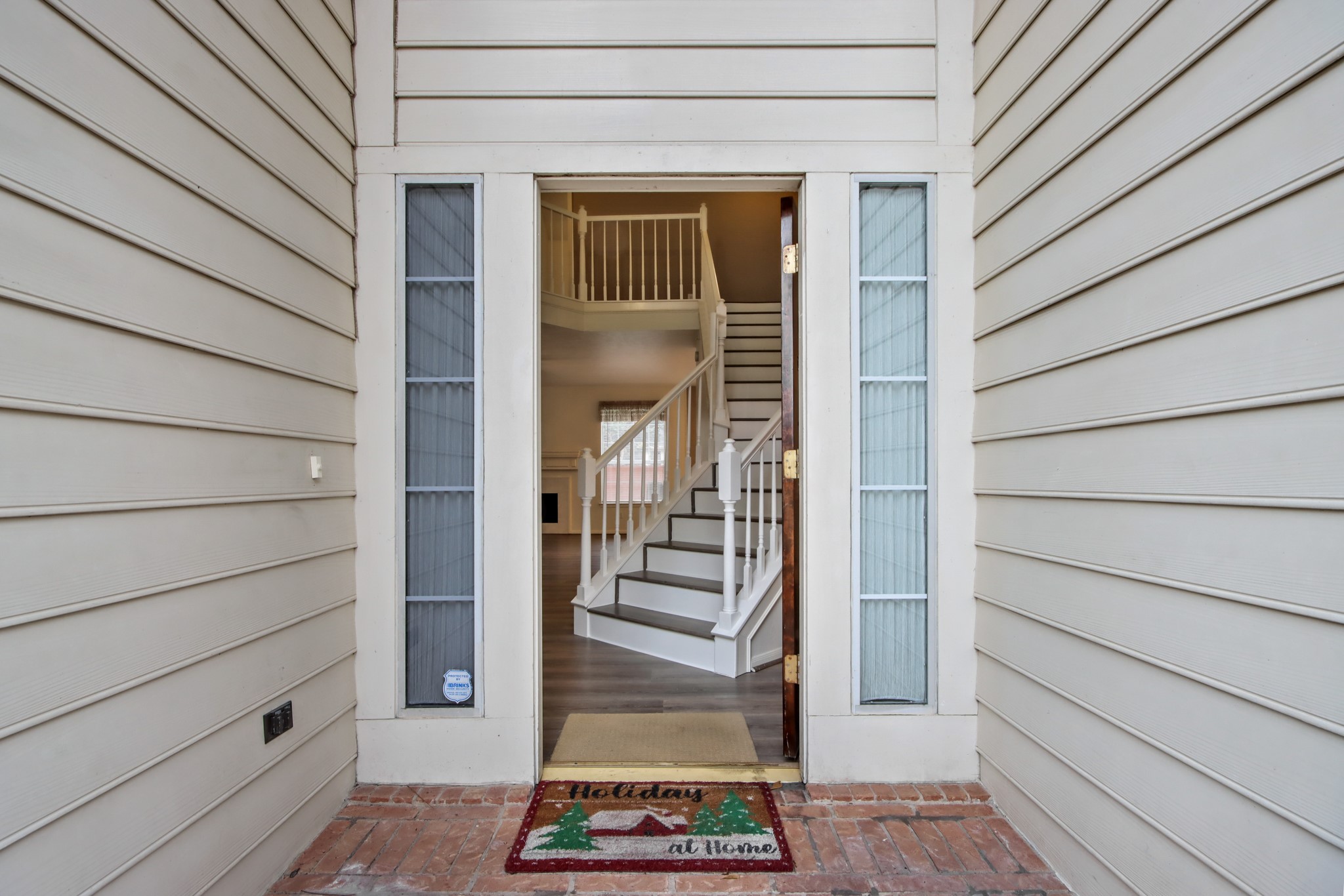 111 South Dreamweaver Circle Spring, TX 77380 - Photo 2 of 30 a view of wooden door and a wooden bench