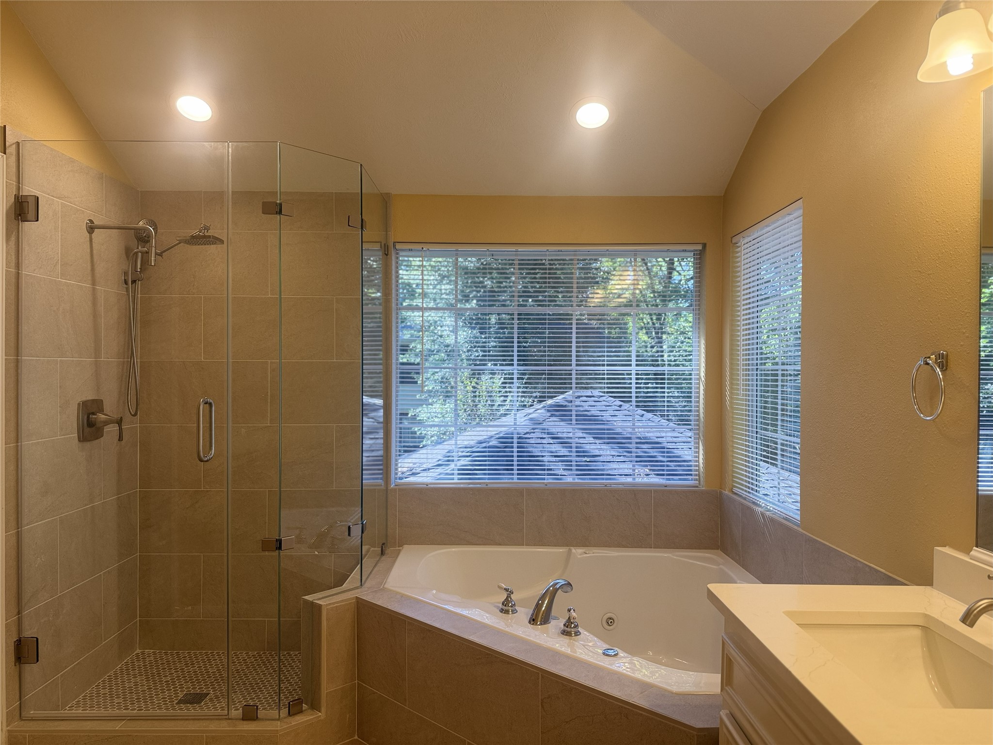 111 South Dreamweaver Circle Spring, TX 77380 - Photo 24 of 30 A shot of the tub and shower in the primary bathroom
