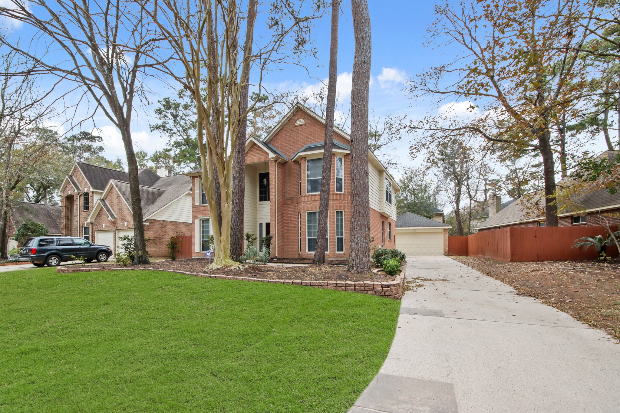 111 South Dreamweaver Circle Spring, TX 77380 - Photo 27 of 30 a front view of a house with a yard