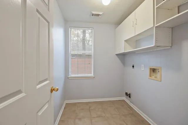 a view of room with window and hardwood floor