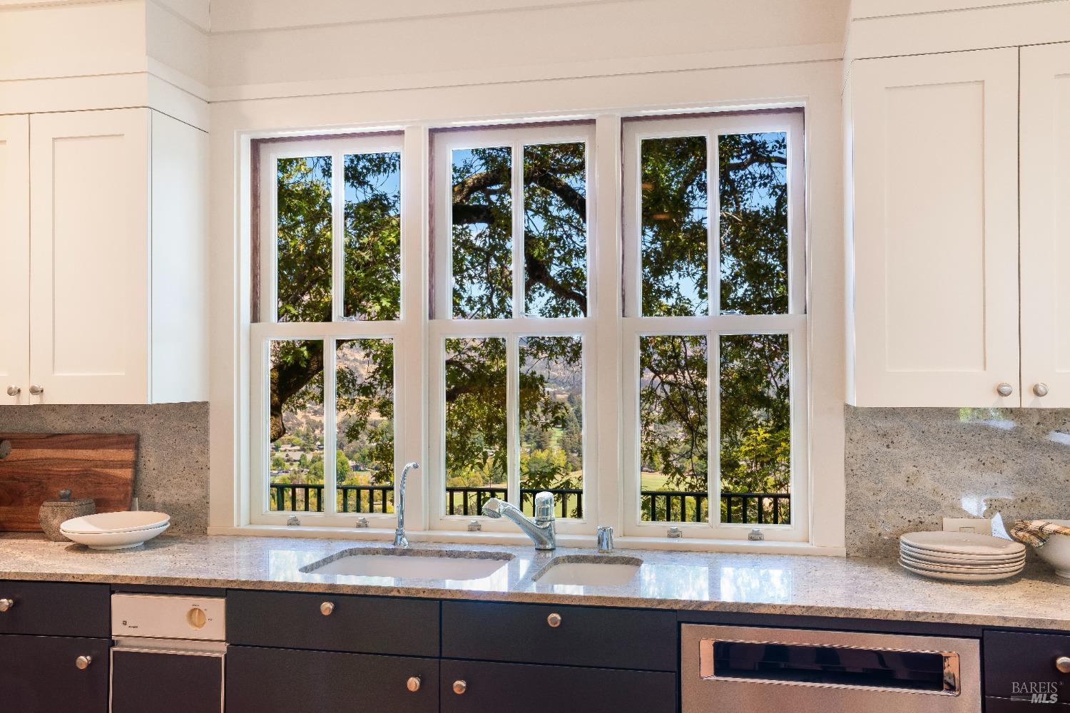 775 White Oak Drive Santa Rosa, CA 95409 - Photo 11 of 62 a kitchen with a window a sink and a window