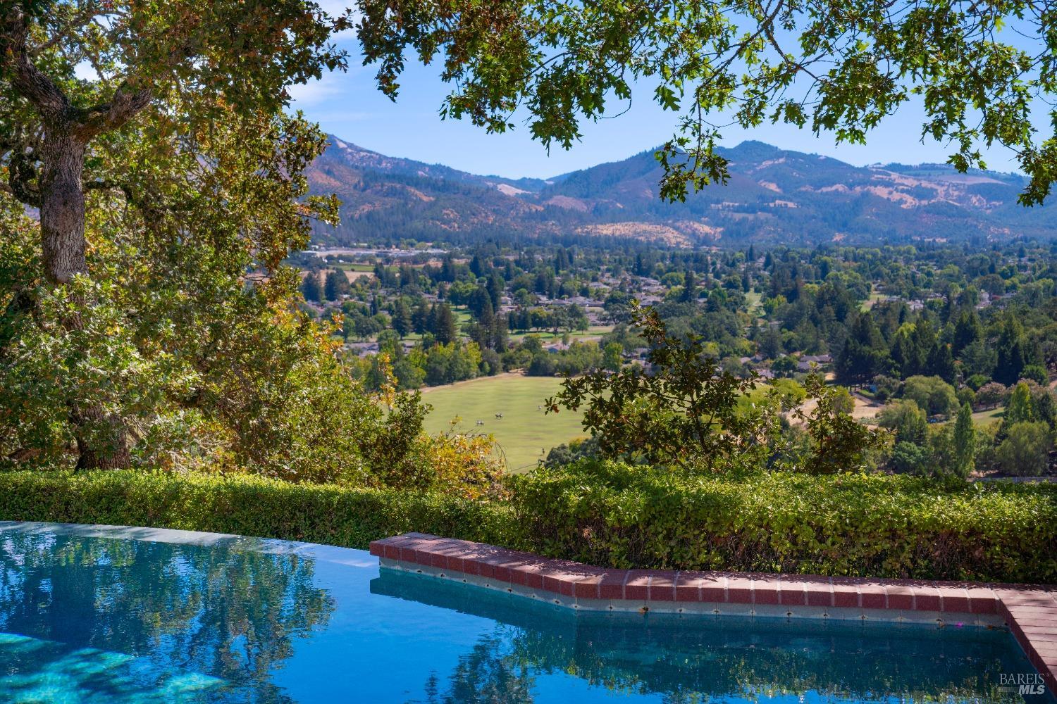 775 White Oak Drive Santa Rosa, CA 95409 - Photo 2 of 62 a view of a lake with a mountain in the background