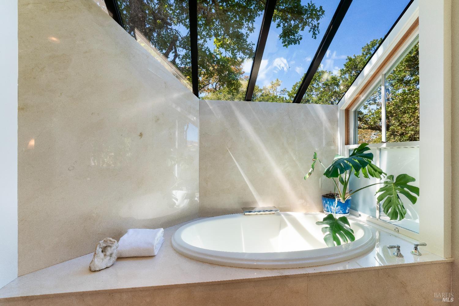 775 White Oak Drive Santa Rosa, CA 95409 - Photo 24 of 62 a white toilet sitting next to a wooden floor
